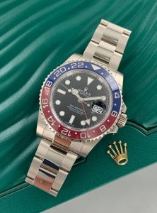 The black dial fake watch has a date window.